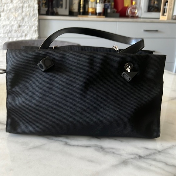 Black canvas authentic Ferragamo bag in excellent condition...